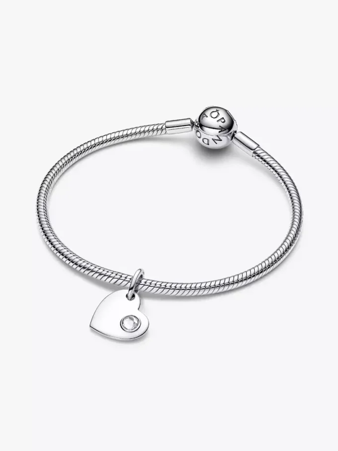 April gravierbarer Herz-Dangle Charm mit klarem Stein aus Sterlingsilber April gravierbarer Herz-Dangle Charm mit klarem Stein aus Sterlingsilber
