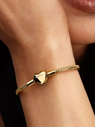 Armband mit facettierter Snake Chain und Herzverschluss, 14-karätig vergoldet