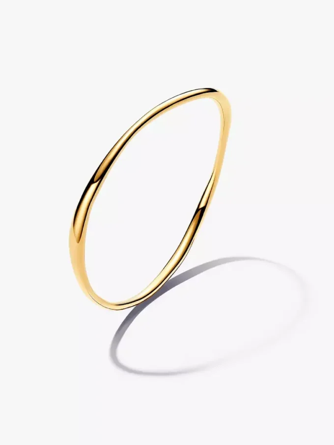 Bangle in organischer Form, 14-karätig vergoldet Bangle in organischer Form, 14-karätig vergoldet