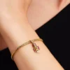 Beweglicher Nussknacker-Dangle Charm, 14-karätig vergoldet