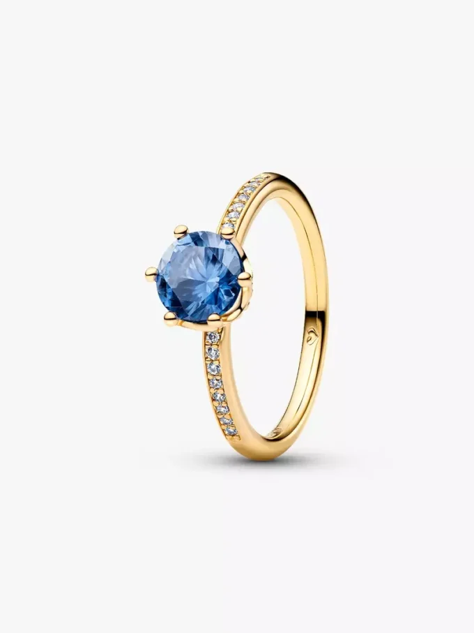 Blauer funkelnder Kronen-Solitärring, 14-karätig vergoldet Blauer funkelnder Kronen-Solitärring, 14-karätig vergoldet