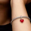Disney Mickey & Minnie Mouse Kiss Dangle Charm aus rotem Murano Glass, Sterlingsilber
