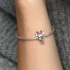 Disney Minnie-Maus-Charm mit gepunktetem Kleid und Schleife aus Sterlingsilber Disney Minnie-Maus-Charm mit gepunktetem Kleid und Schleife aus Sterlingsilber