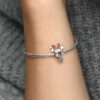 Disney Minnie-Maus-Charm mit gepunktetem Kleid und Schleife – Sterlingsilber Disney Minnie-Maus-Charm mit gepunktetem Kleid und Schleife – Sterlingsilber