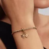 Dreifach-Dangle Charm mit Flugzeug, Globus und Koffer, 14-karätige Vergoldung Dreifach-Dangle Charm mit Flugzeug, Globus und Koffer, 14-karätige Vergoldung