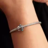 Durchbrochener Fisch-Charm aus Sterlingsilber Durchbrochener Fisch-Charm aus Sterlingsilber