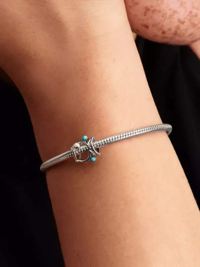 Durchbrochener Fisch-Charm aus Sterlingsilber Durchbrochener Fisch-Charm aus Sterlingsilber