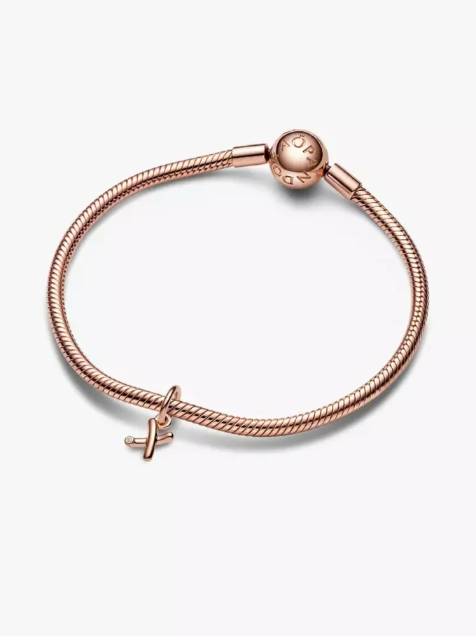 Endgültiger Verkauf – Buchstabe X in Schreibschrift als Dangle Charm, 14 Karat Roségold-Beschichtung Endgültiger Verkauf – Buchstabe X in Schreibschrift als Dangle Charm, 14 Karat Roségold-Beschichtung