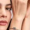 Endgültiger Verkauf – Charm mit verschlungenen Herzen für UNICEF aus Sterlingsilber Endgültiger Verkauf – Charm mit verschlungenen Herzen für UNICEF aus Sterlingsilber