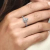Funkelnder Halo-Ring mit Birnsteinen aus Sterlingsilber Funkelnder Halo-Ring mit Birnsteinen aus Sterlingsilber