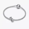 Funkelnder Schleifen-Charm aus Sterlingsilber Funkelnder Schleifen-Charm aus Sterlingsilber