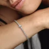 Funkelndes Halo-Tennisarmband aus Sterlingsilber