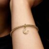 Glückshufeisen-Dangle Charm – 14 Karat vergoldet Glückshufeisen-Dangle Charm – 14 Karat vergoldet