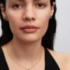 Halskette mit grünem Glücksklee-Anhänger, 14 Karat vergoldet Halskette mit grünem Glücksklee-Anhänger, 14 Karat vergoldet