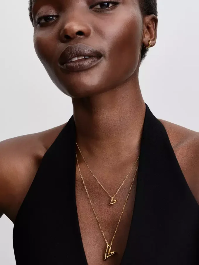 Halskette mit kleinem Anhänger in organischer Herzform, 14 Karat vergoldet