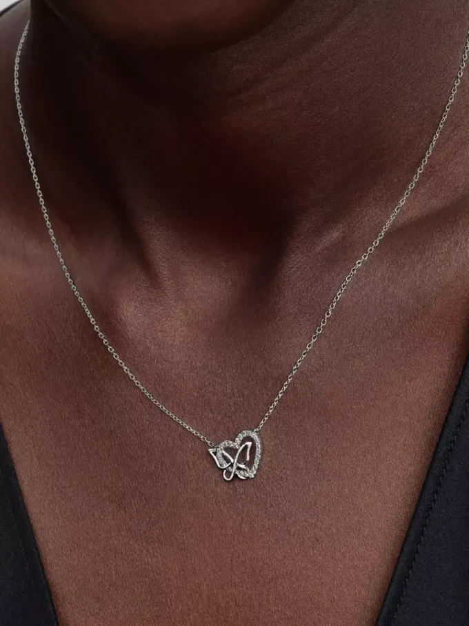 Halskette mit verschlungenem Herz- und Schmetterlingsanhänger aus Sterlingsilber Halskette mit verschlungenem Herz- und Schmetterlingsanhänger aus Sterlingsilber