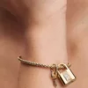 Hängender Dangle Charm „Vorhängeschloss & Schlüssel“ mit 14-karätiger Vergoldung Hängender Dangle Charm „Vorhängeschloss & Schlüssel“ mit 14-karätiger Vergoldung