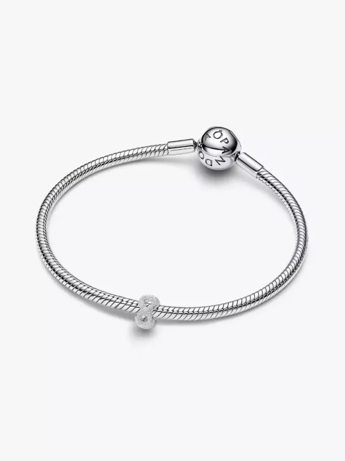 Mini-Charm mit strukturiertem Unendlichkeitssymbol aus Sterlingsilber Mini-Charm mit strukturiertem Unendlichkeitssymbol aus Sterlingsilber