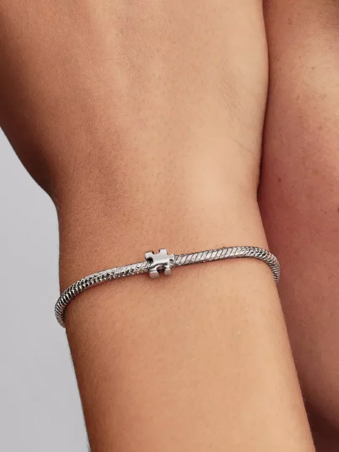 Mini-Charm „Puzzleteil“ aus Sterlingsilber Mini-Charm „Puzzleteil“ aus Sterlingsilber