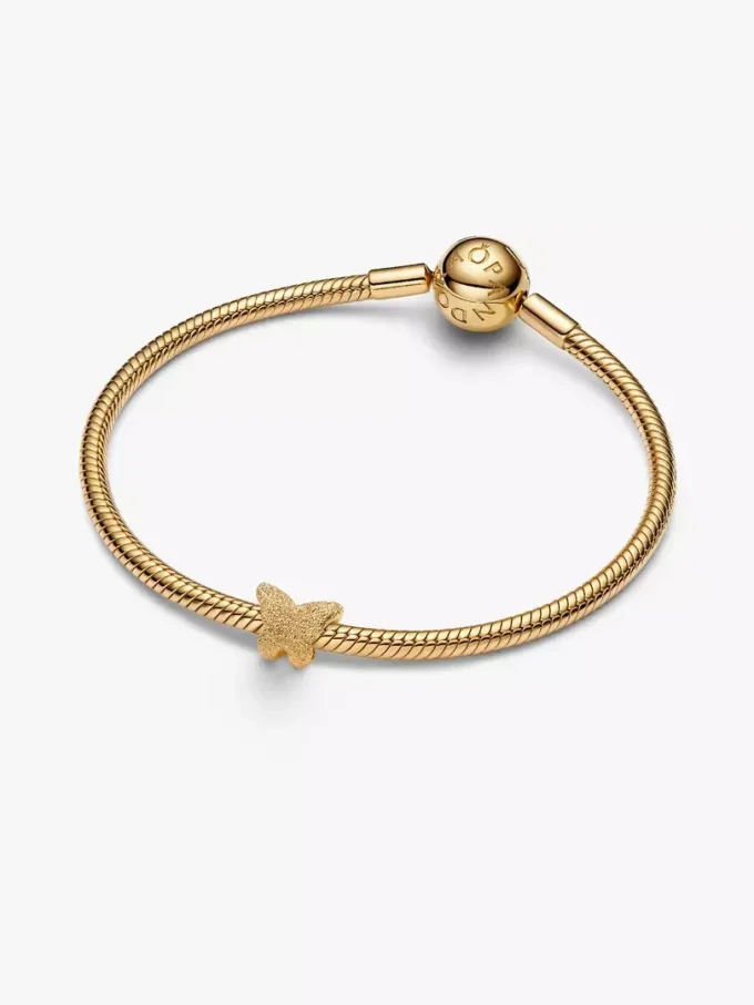 Mini-Charm „Strukturierter Schmetterling“, 14-karätig vergoldet Mini-Charm „Strukturierter Schmetterling“, 14-karätig vergoldet