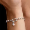 Mini-Dangle Charm „Pearl & Arrows“ aus Sterlingsilber Mini-Dangle Charm „Pearl & Arrows“ aus Sterlingsilber