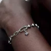 Mini-Dangle Charm „Stern“ aus Sterlingsilber Mini-Dangle Charm „Stern“ aus Sterlingsilber