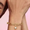 Pandora ME Dangle Charm „Sonne“ mit behandelter Süßwasserzuchtperle, 14-karätig vergoldet