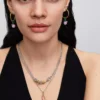Rosa Raupen-Charm, 14-karätig vergoldet