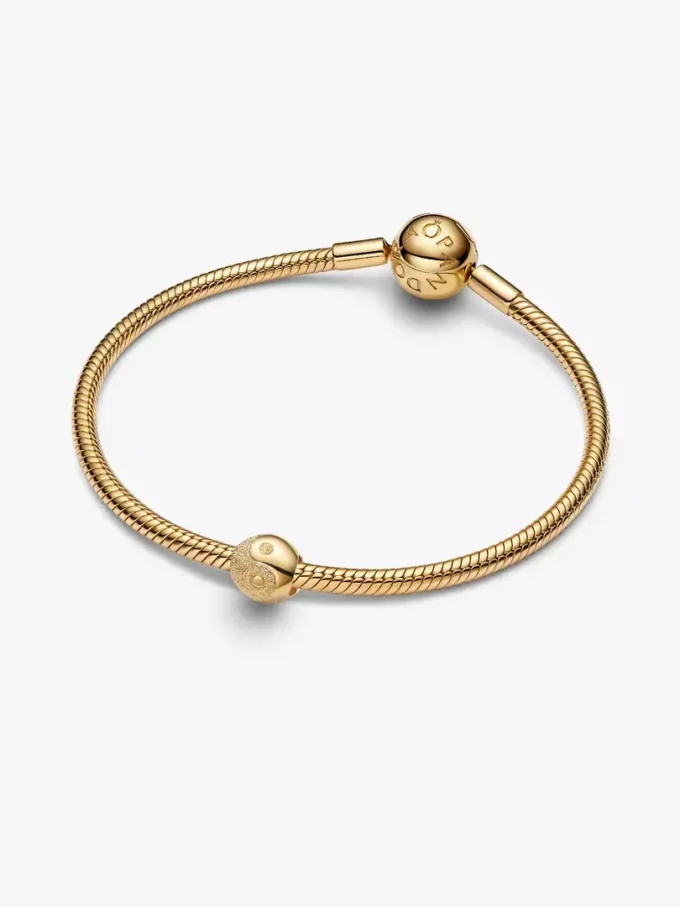 Strukturierter Yin-und-Yang-Mini-Charm, 14-karätig vergoldet Strukturierter Yin-und-Yang-Mini-Charm, 14-karätig vergoldet