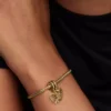 Teilbarer Puzzleteil-Herz-Dangle Charm, 14-karätig vergoldet Teilbarer Puzzleteil-Herz-Dangle Charm, 14-karätig vergoldet