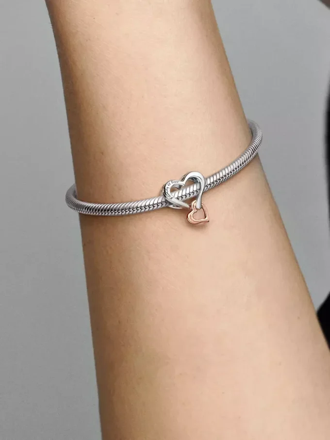 Zweifarbiger, durchbrochener Unendlichkeits-Herz-Charm aus Sterlingsilber, 14 Karat Roségold-Beschichtung Zweifarbiger, durchbrochener Unendlichkeits-Herz-Charm aus Sterlingsilber, 14 Karat Roségold-Beschichtung